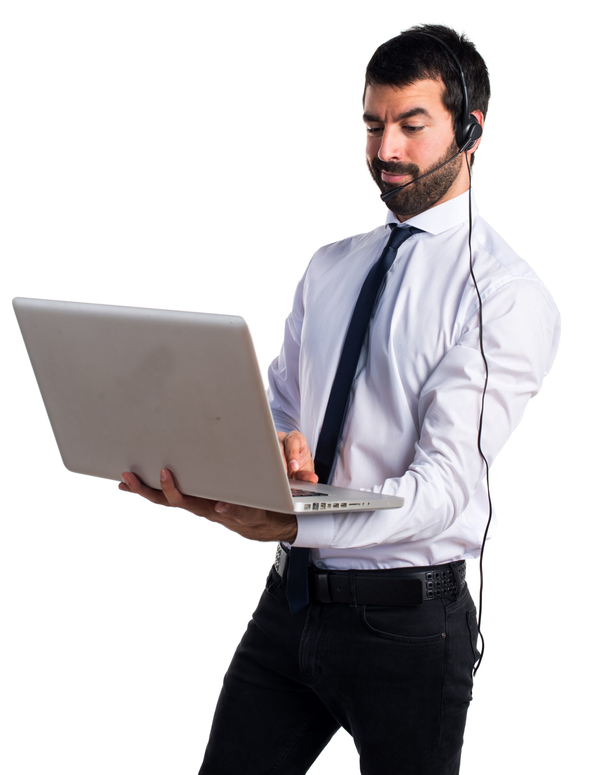 A man holding on his laptop and wearing his headset and calling a client