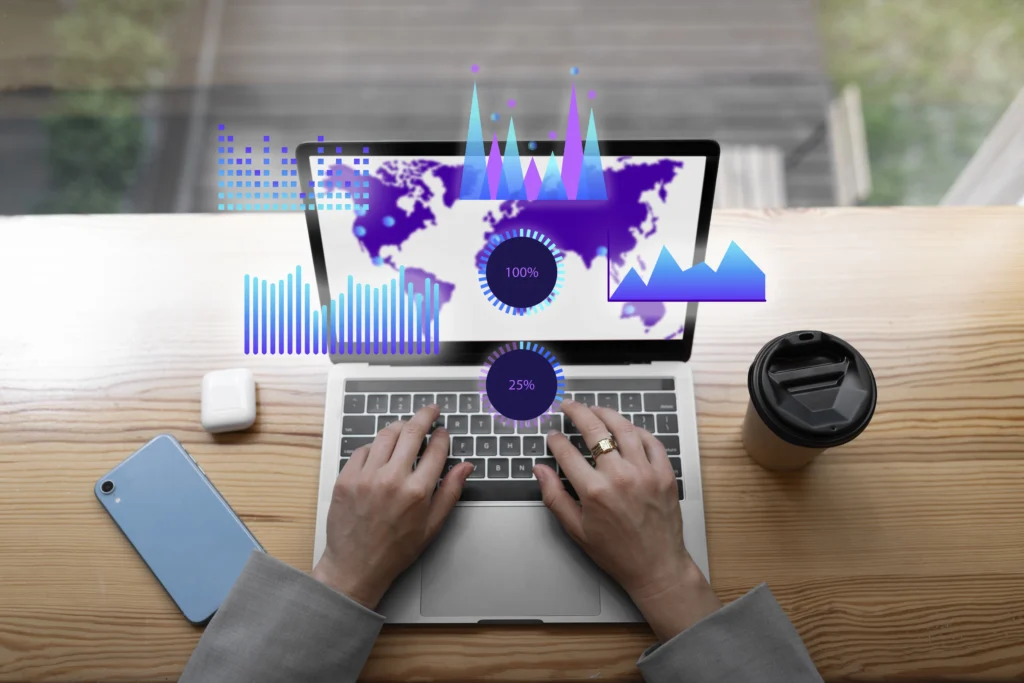 A presentation showcasing a 3D world map with data latest outsourcing trends and insights displayed on a screen. In the foreground, a woman's hands are seen typing on a laptop, illustrating engagement with the information. The scene captures a dynamic blend of technology and analysis, highlighting the importance of data in understanding global trends.